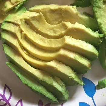 reviewer photo showing their perfectly sliced avocado on a plate 