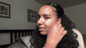A gif of a tester looking at the results of the foundation.