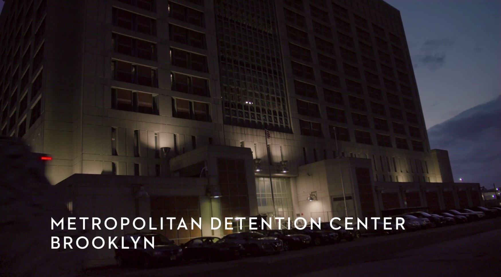 An imposing building and the text &quot;Metropolitan Detention Center, Brooklyn&quot;