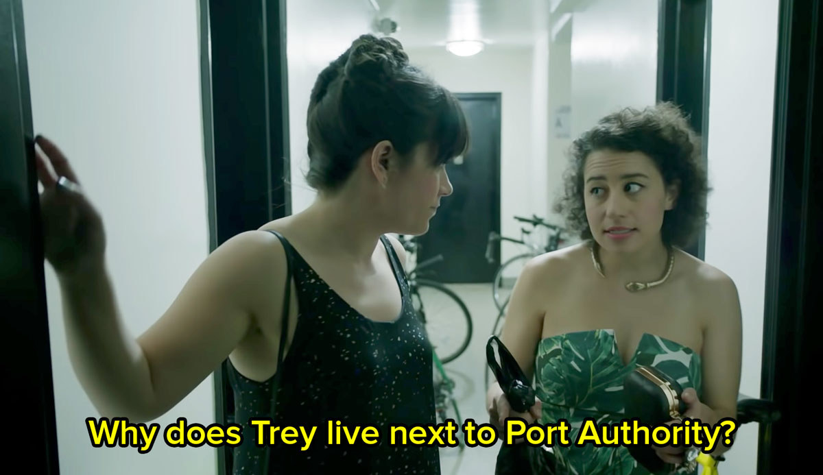 Ilana and Abbi from Broad City stand in a hallway and Ilana says why does Trey live next to Port Authority