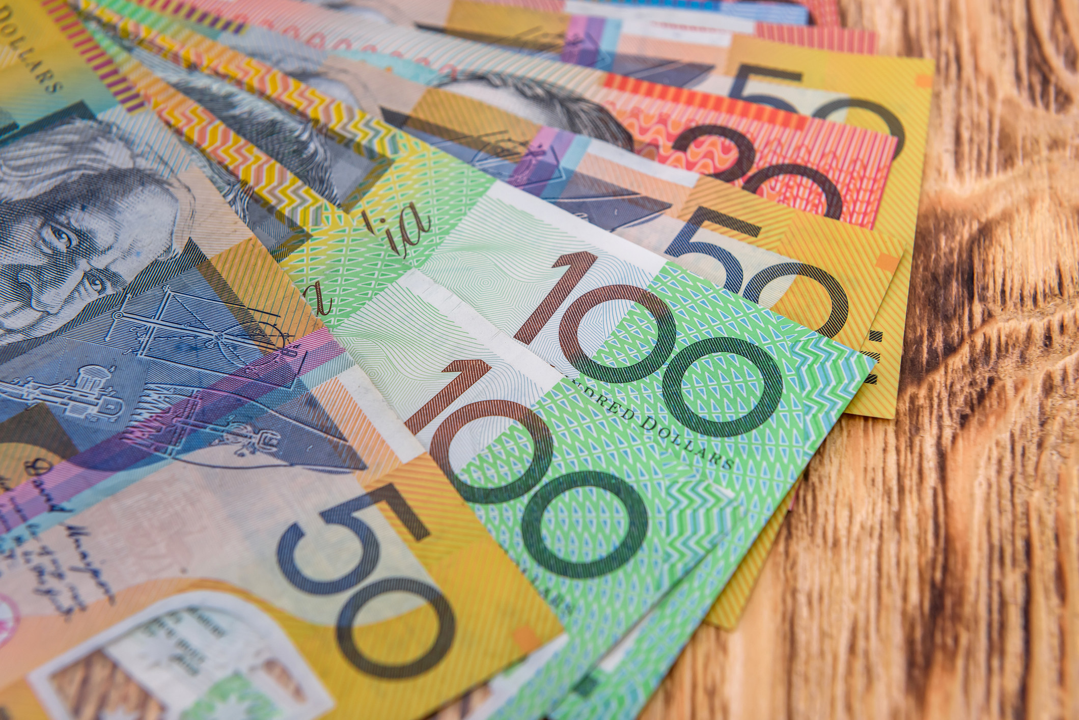 australian $50, $100, and $20 banknotes, which are all different colors