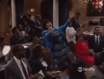 Lisa dances energetically through the aisles of a church