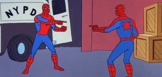 Two identical spider mans pointing at each other