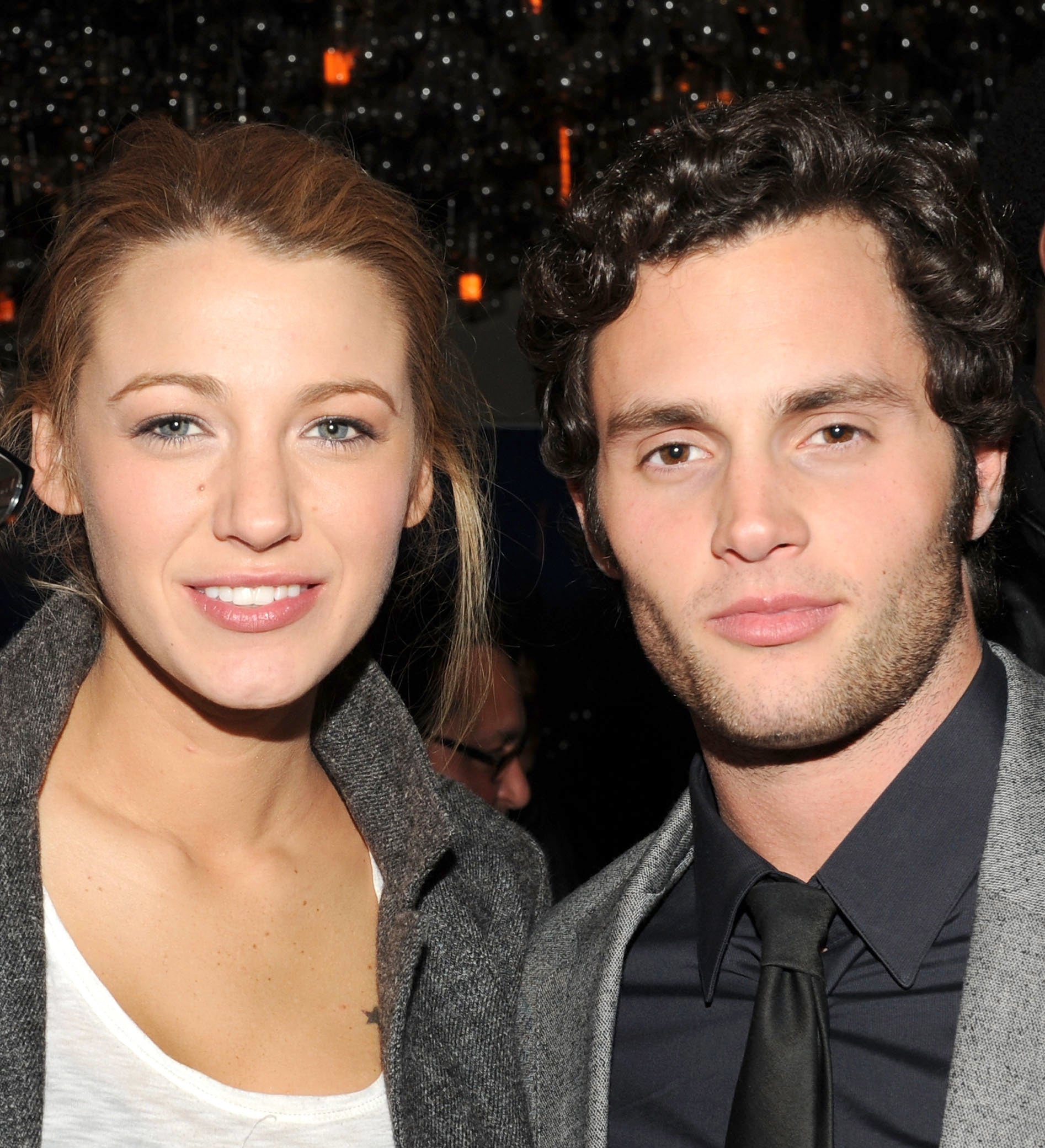 A photo of Blake Lively and Penn Badgley at event in 2010