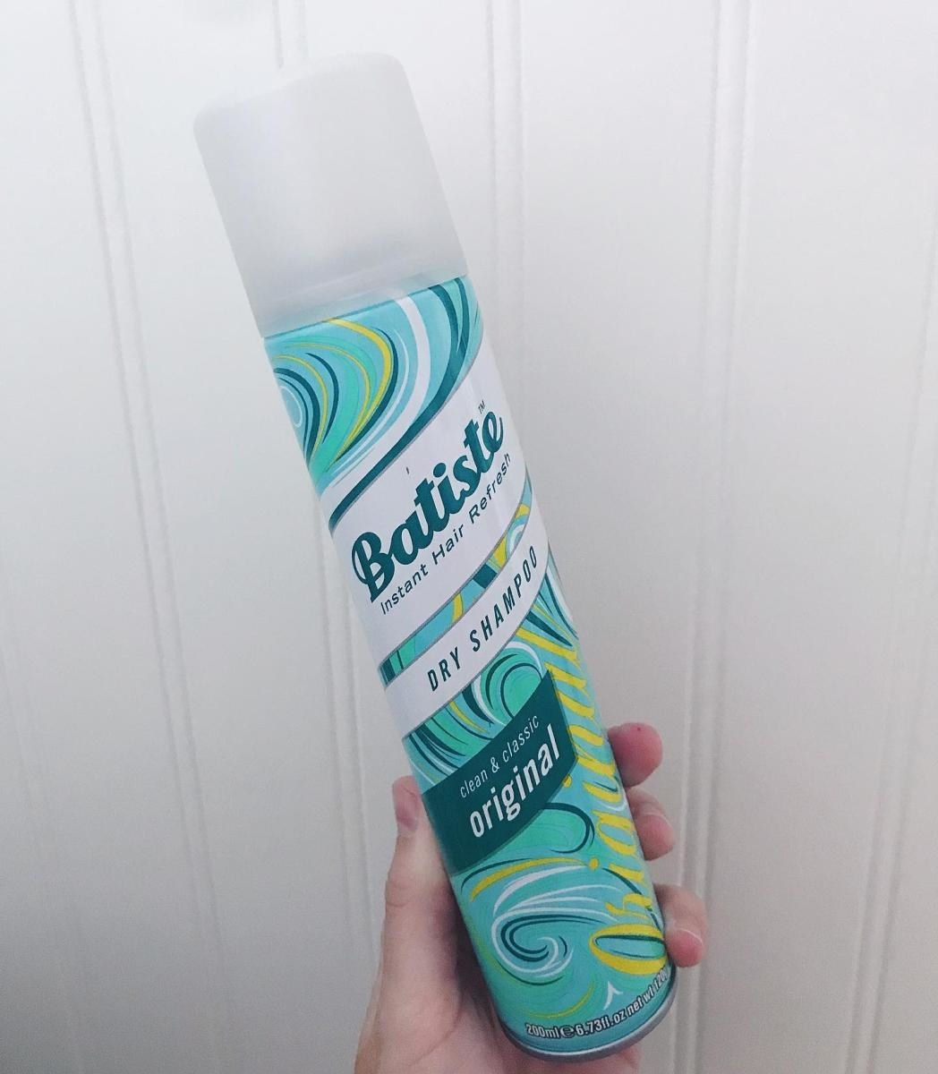 A model holds the Batiste Clean &amp;amp; Classic dry shampoo