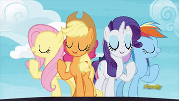 A GIF of the ponies signing while spinning