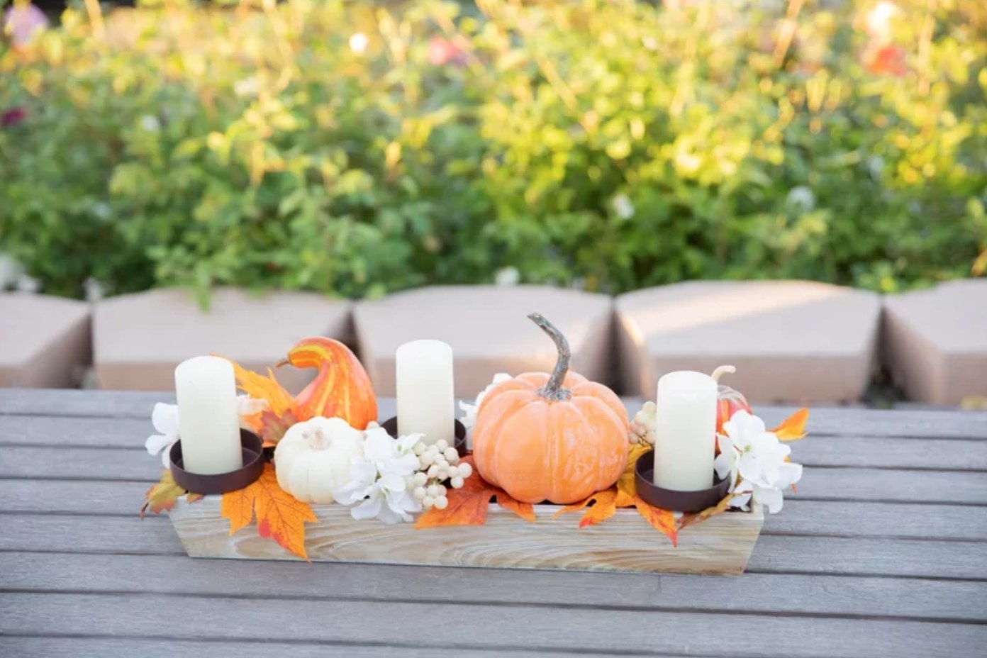 The holiday arrangement pumpkin candle holder