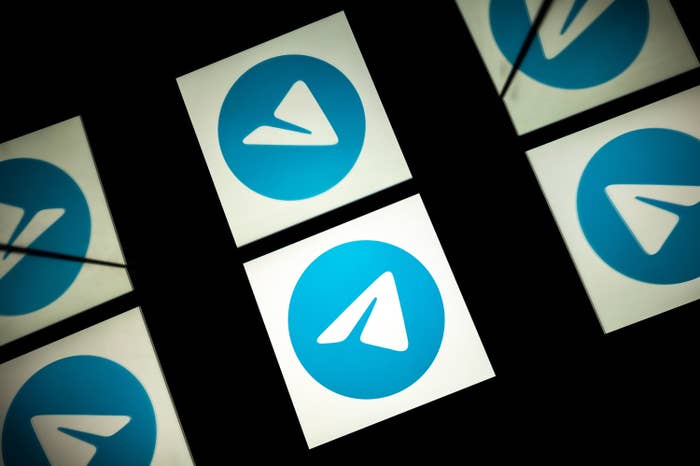 This picture shows the paper plane logo of mobile messaging and call service Telegram on a tablet.