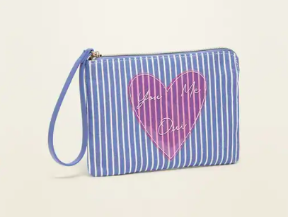 A wristlet with stripes and a hair that says you me oui