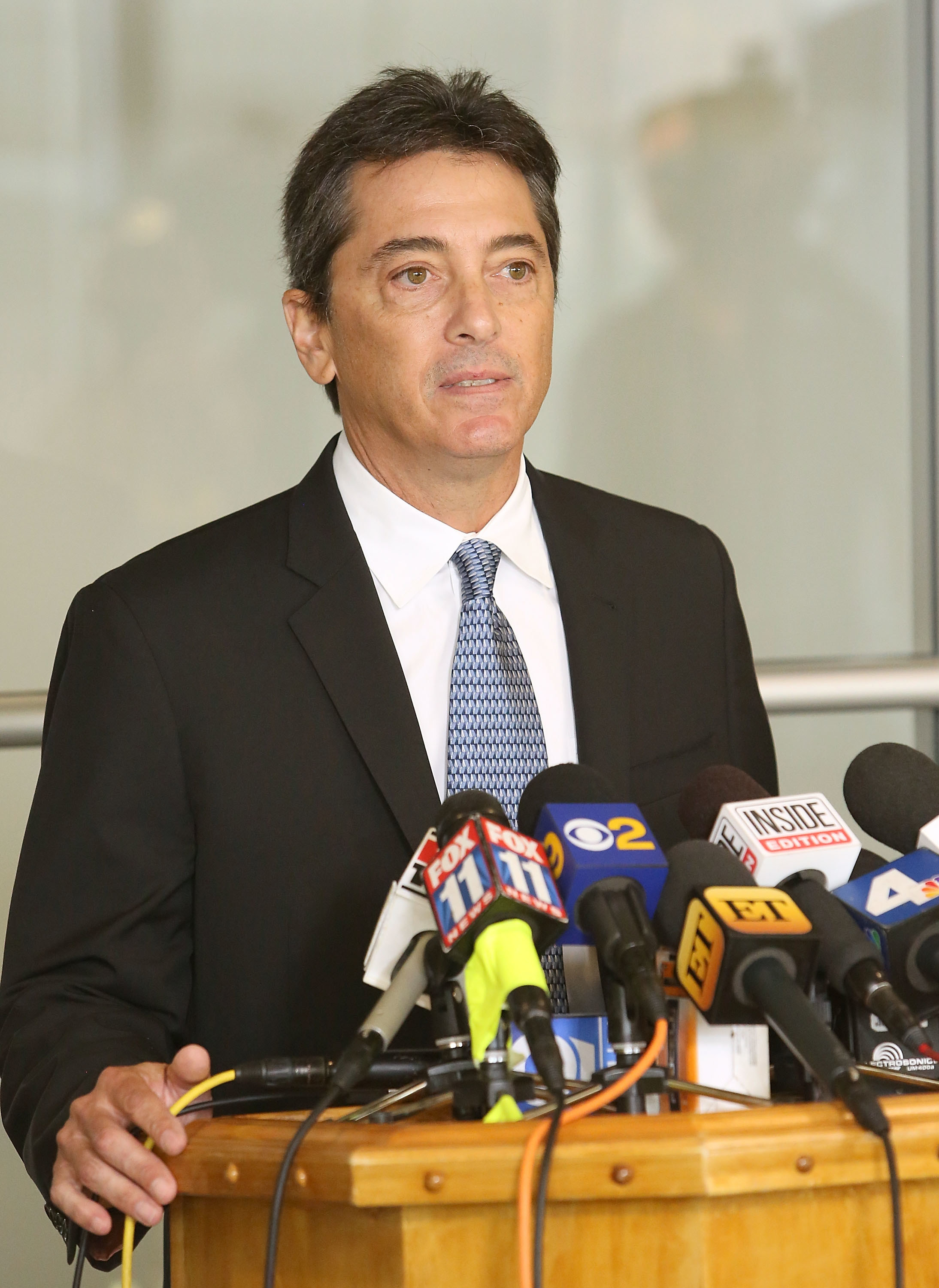 Scott speaking at a press conference
