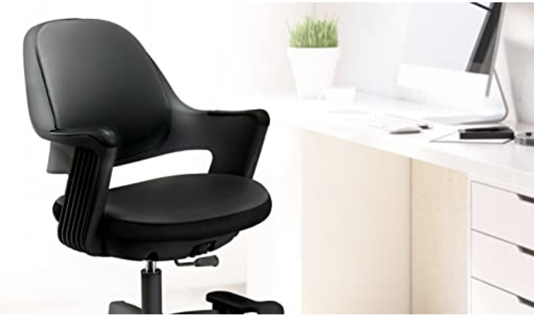 Black swivel height adjustable office chair with arm rests