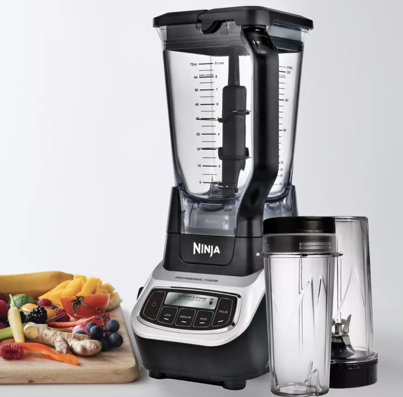 the silver and black blender with two clear glasses next to it