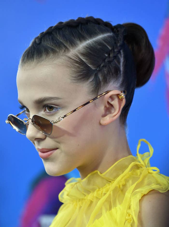Millie Bobby brown wearing tiny sunglasses