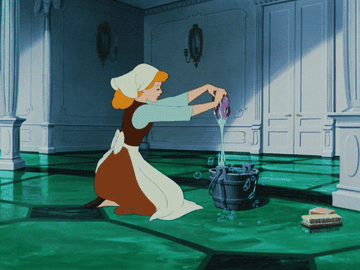gif of cinderella squeezing out a sponge. over a bucket
