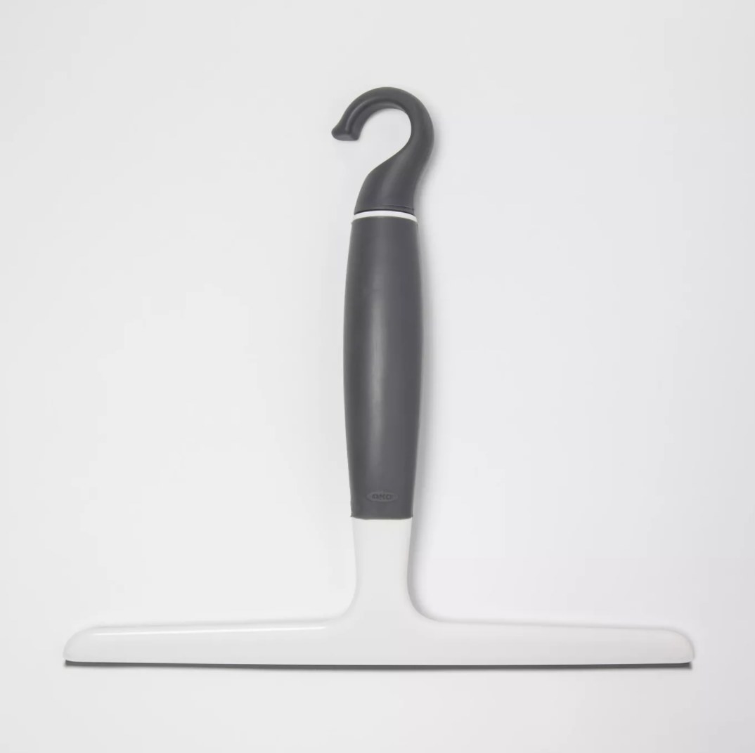 A white and gray plastic squeegee
