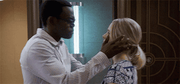 Chidi wallking straight up to Eleanor, gently grabbing her face, and kissing her.