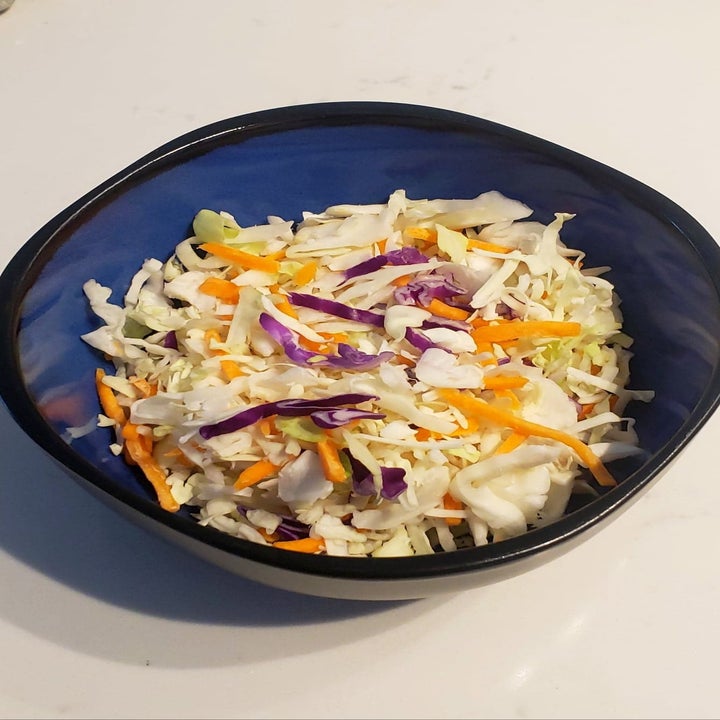 A bole of the cabbage and carrot slaw