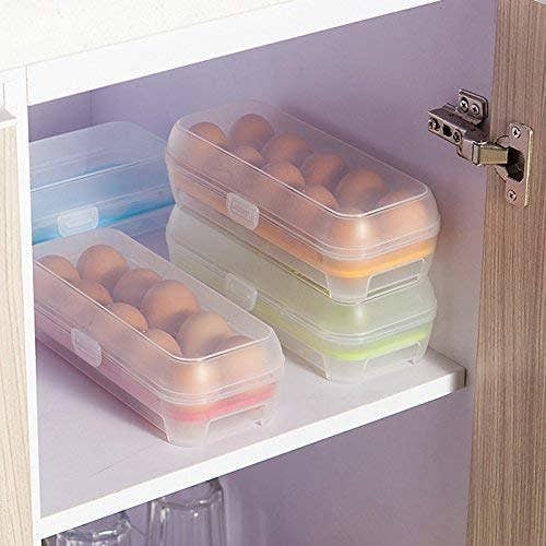 Three egg containers on a shelf with brown eggs in them.