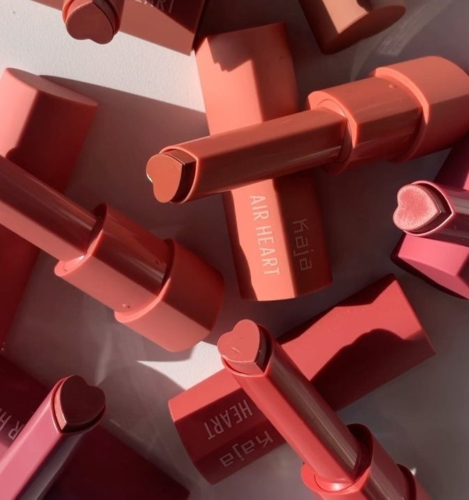 Several heart-shaped lipsticks