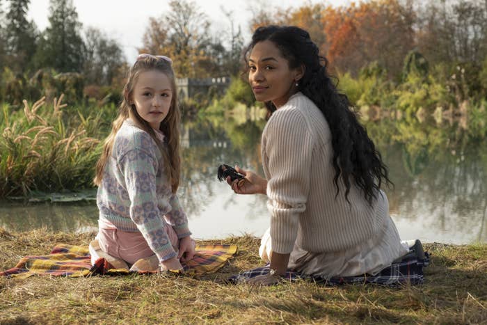 Flora and Rebecca Jessel sitting near the lake