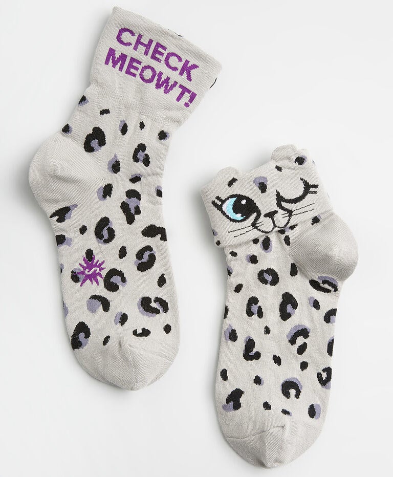 A pair of ankle socks with cat faces on them