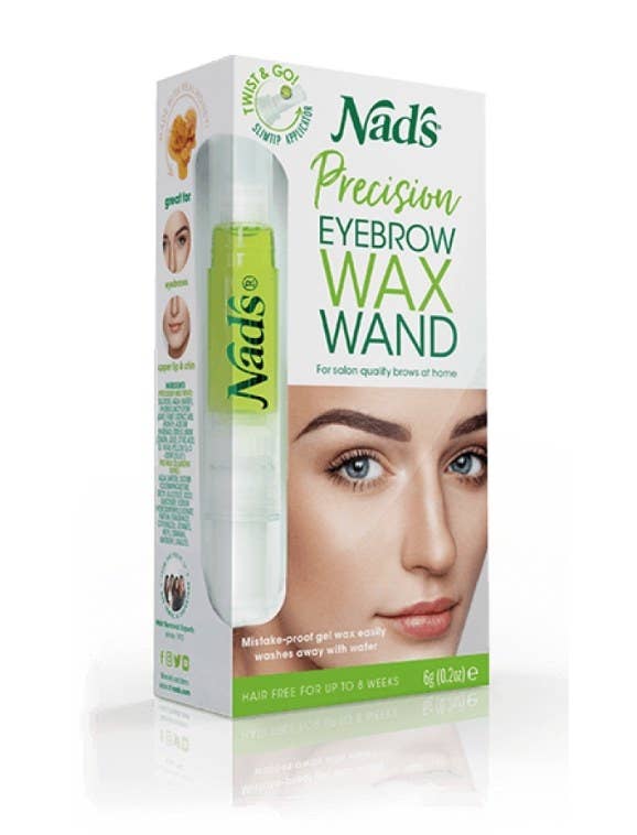 Box for eyebrow wax wand kit with woman&#x27;s face on cover next to green wax pen image and green logo for Nad&#x27;s