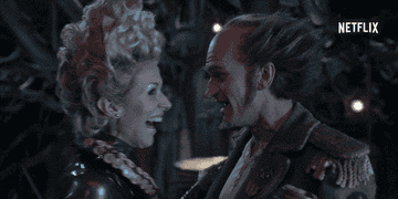 Olaf and Esme dramatically laughing together