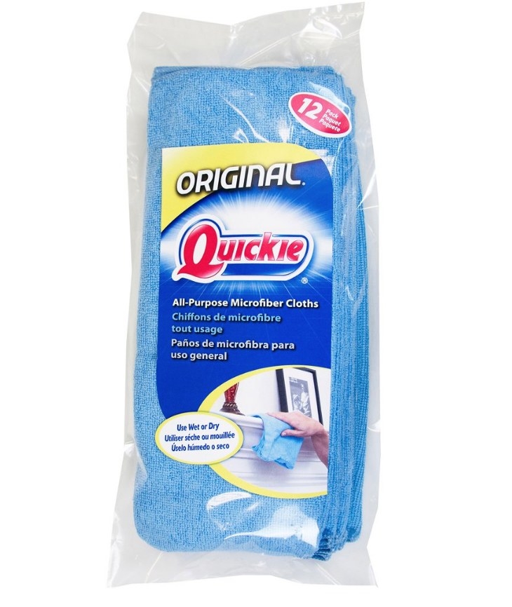 Packaging for Quickie microfiber clothes with Quickie logo and image of hand using cloth on clear package of blue clothes