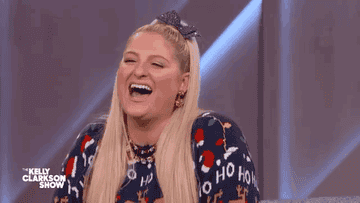A GIF of Meghan Trainor laughing