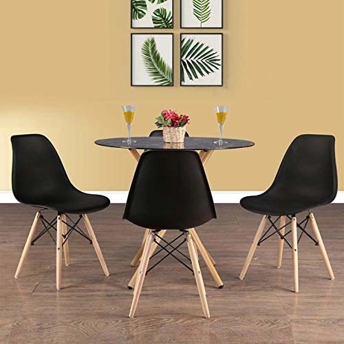 A modern dining table set with 3 chairs