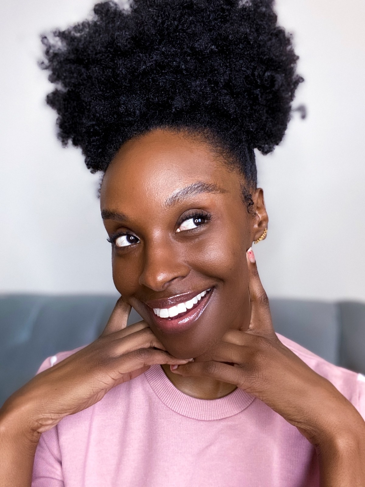 Essence smiles with fresh, glowing skin after completing her new Function of Beauty customizable skincare.