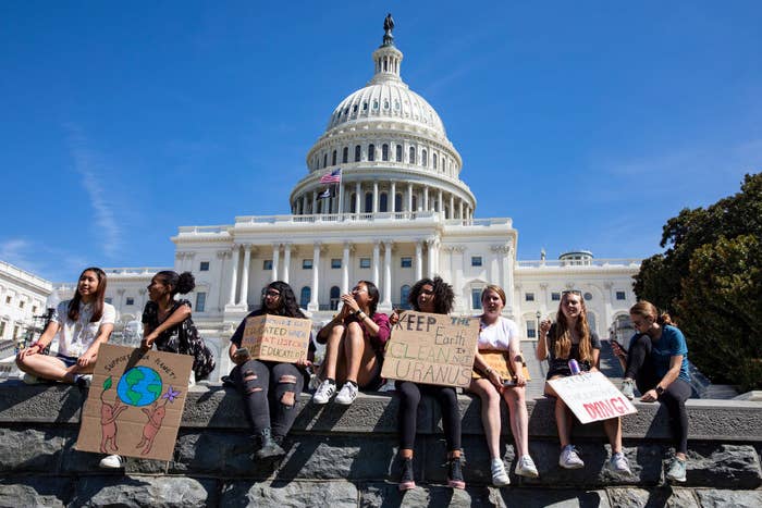 Teens protesting climate change outside the Capitol