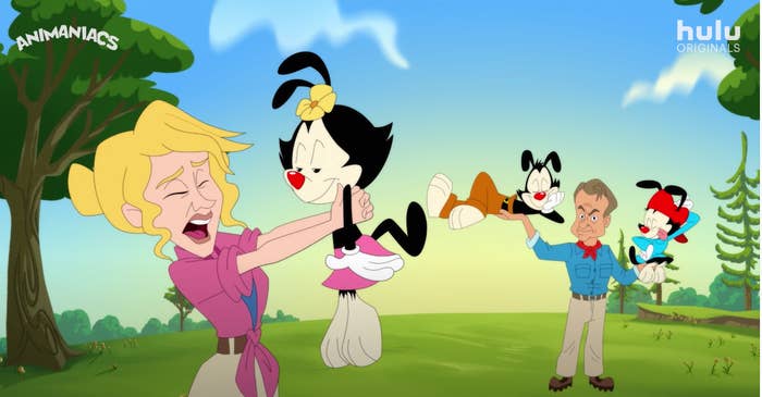 A screenshot of the teaser trailer of Yakko, Wakko, and Dot being held by Laura Dern and Sam Neill&#x27;s characters from Jurassic Park