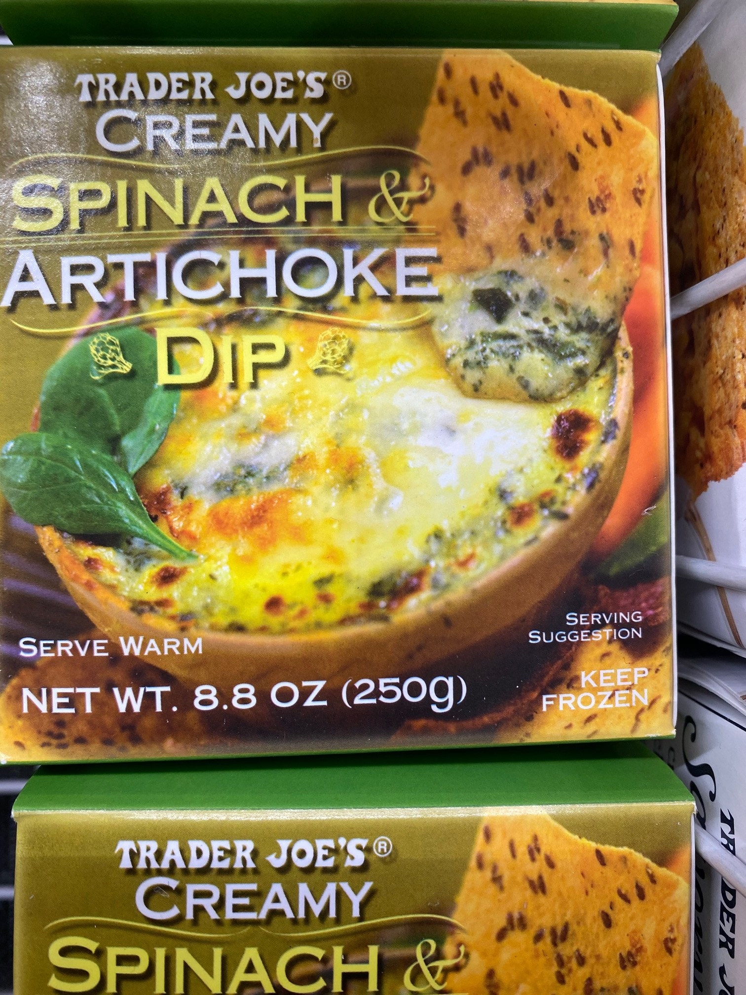 Boxes of creamy spinach and artichoke dip from Trader Joe&#x27;s.