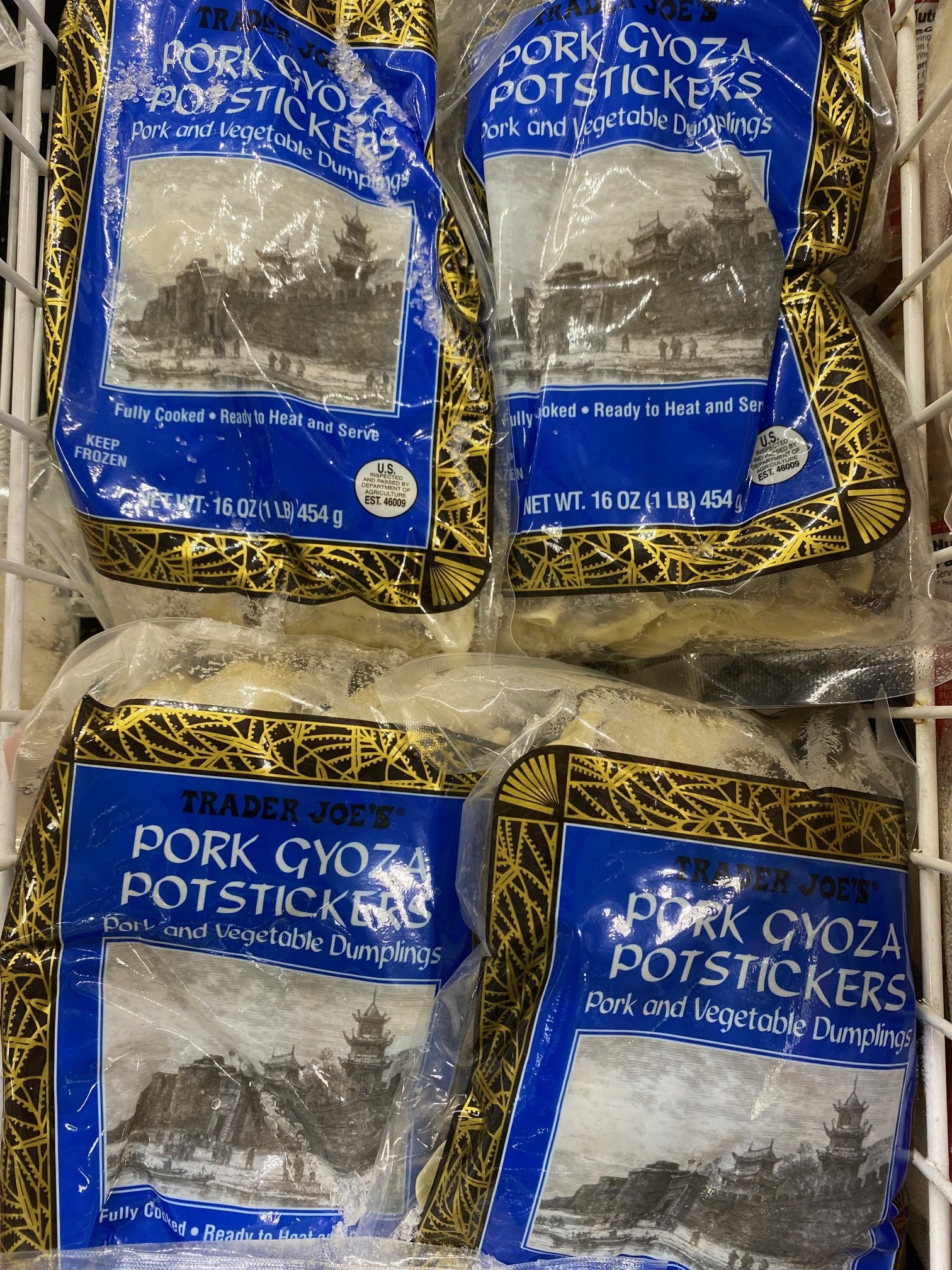 Bags of Trader Joe&#x27;s frozen pork gyoza potstickers.