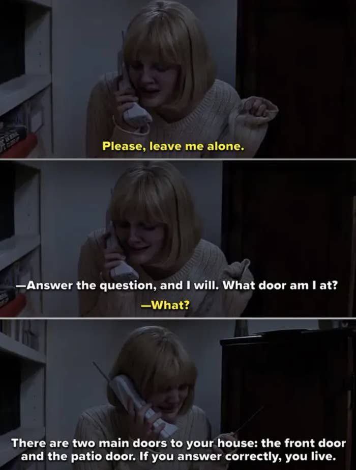 Casey hiding in her house, talking on the phone with Ghostface