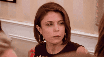 A gif of one of the Real Housewives of New York giving a skeptical expression.