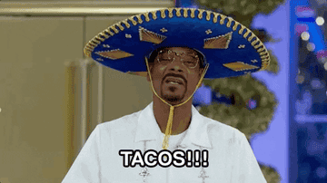 Snoop Dogg in a blue sombrero gestures with his hands and says &quot;tacos!&quot;