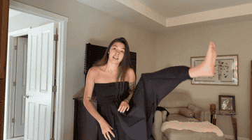 A gif of one of the testers dancing around in the jumpsuit.