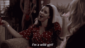 Woman exclaiming, &quot;I&#x27;m a wild girl!&quot;
