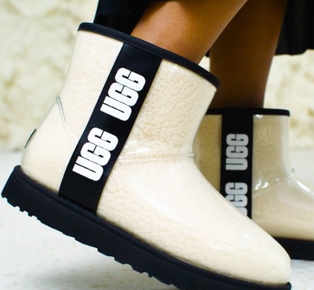 A person wearing the transparent Ugg boots