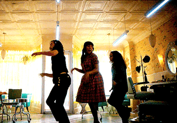 Klaus, Allison, and Vanya from The Umbrella Academy dancing