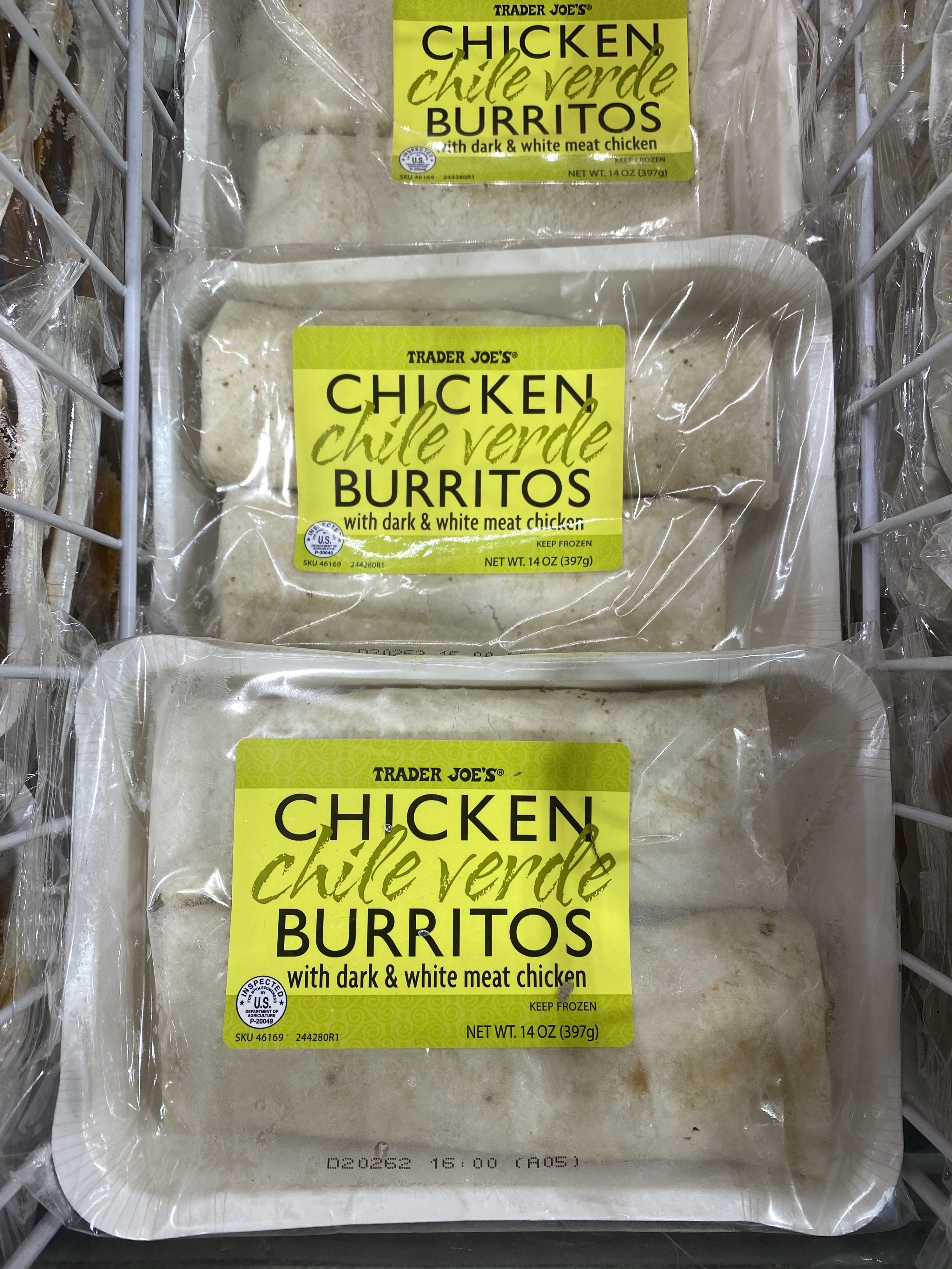 Packages of frozen chicken chile verde burritos from Trader Joe&#x27;s.