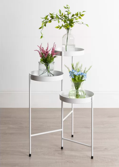 the plant stand in white with three plants on it 