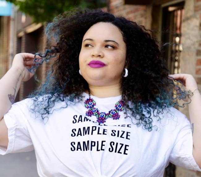 a BuzzFeed Shopping editor in a pinkish purple matte lipstick