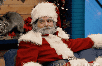 Zach Galifianakis dressed as Santa Claus.