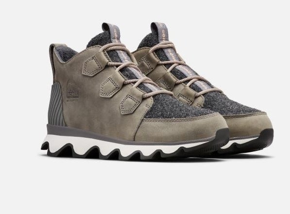 The sneaker-style shoe with white sole, olive green and dark grey body and laces.