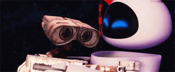 EVE giving Wall-E a robot kiss. 