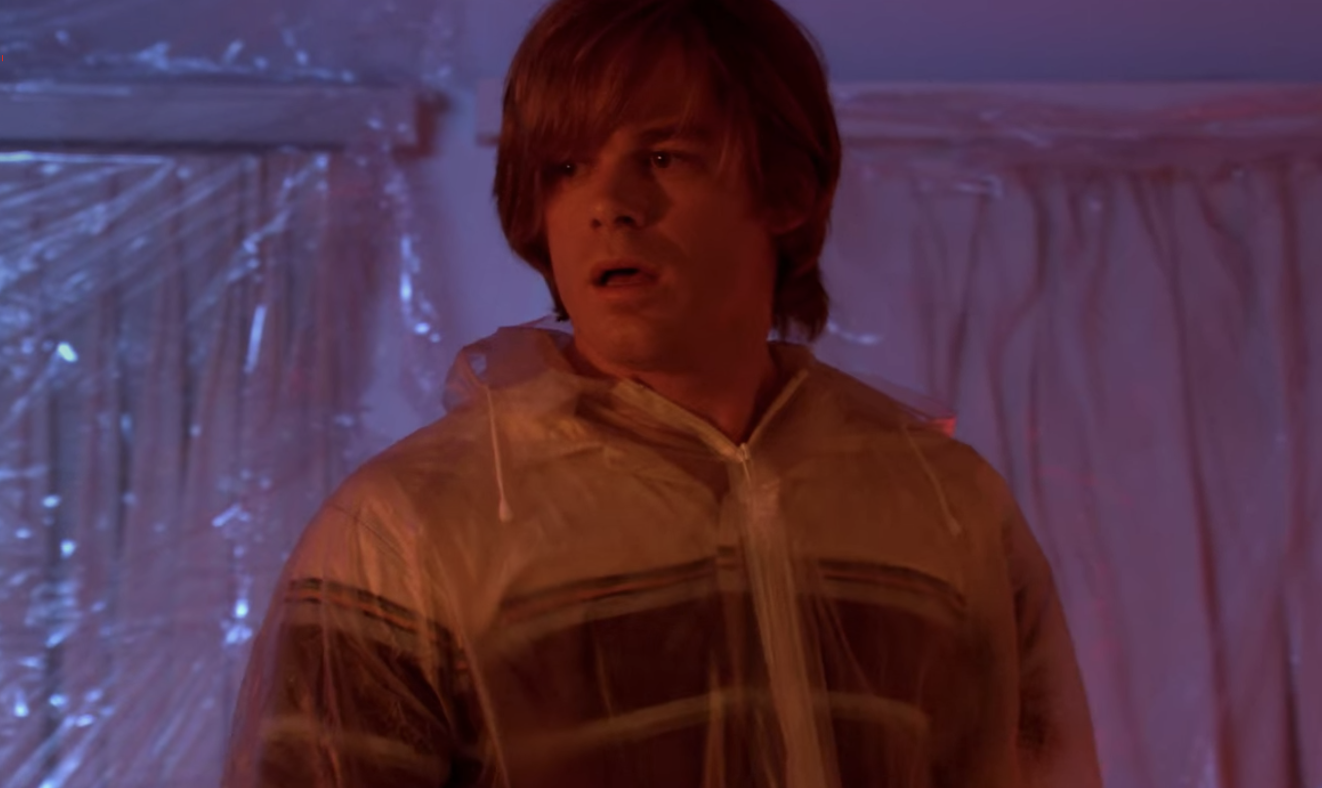 Michael C. Hall wearing a wig with long bangs