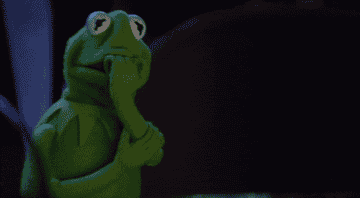 Kermit the Frog bites his nails anxiously.